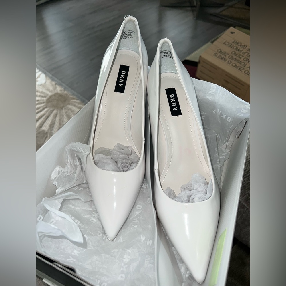 White WHT DKNY Pump. Worn once to my sorority function. Size 10, 3.9 inch heel.